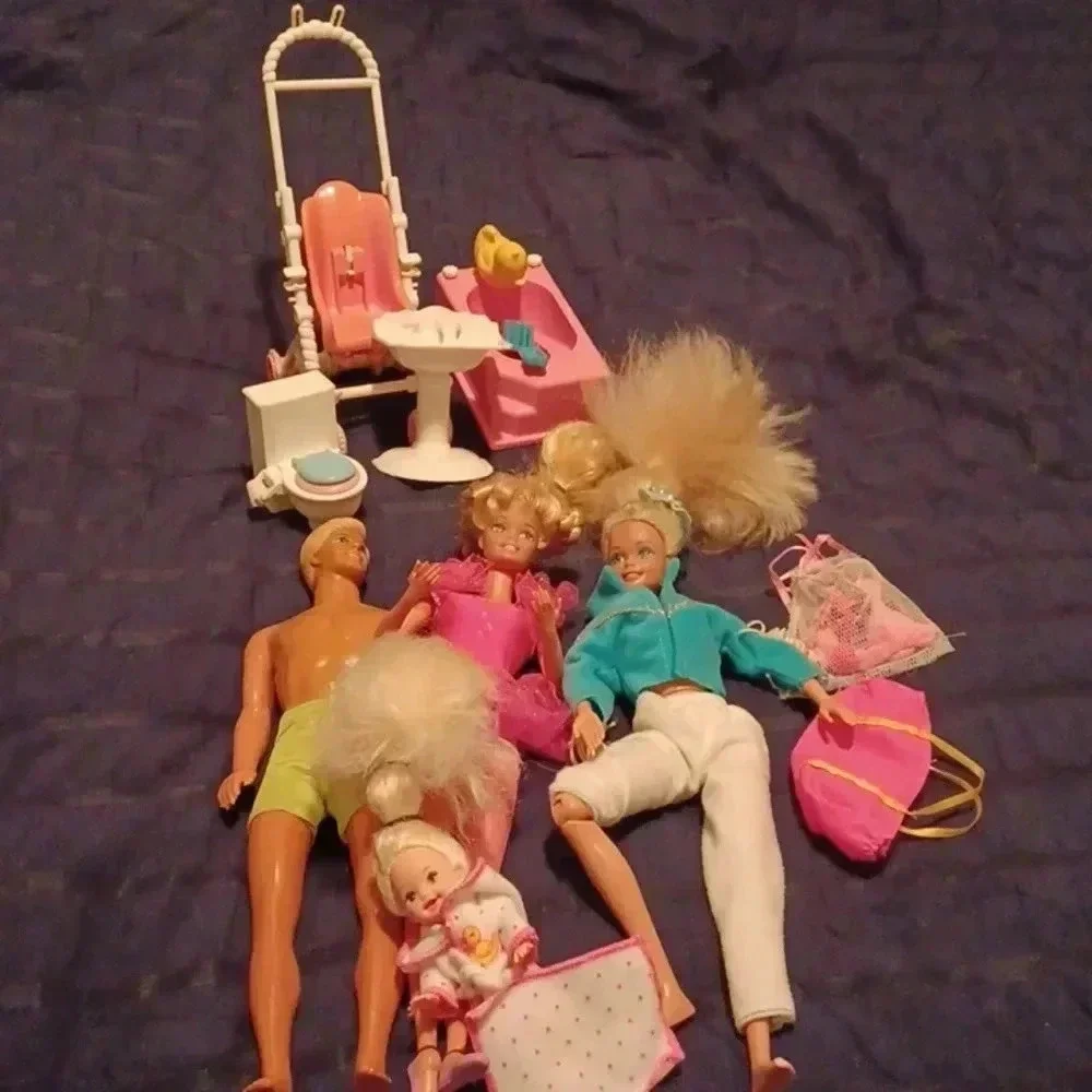 2 vintage Mattel Barbie dolls , one  Ken and one mini with extras